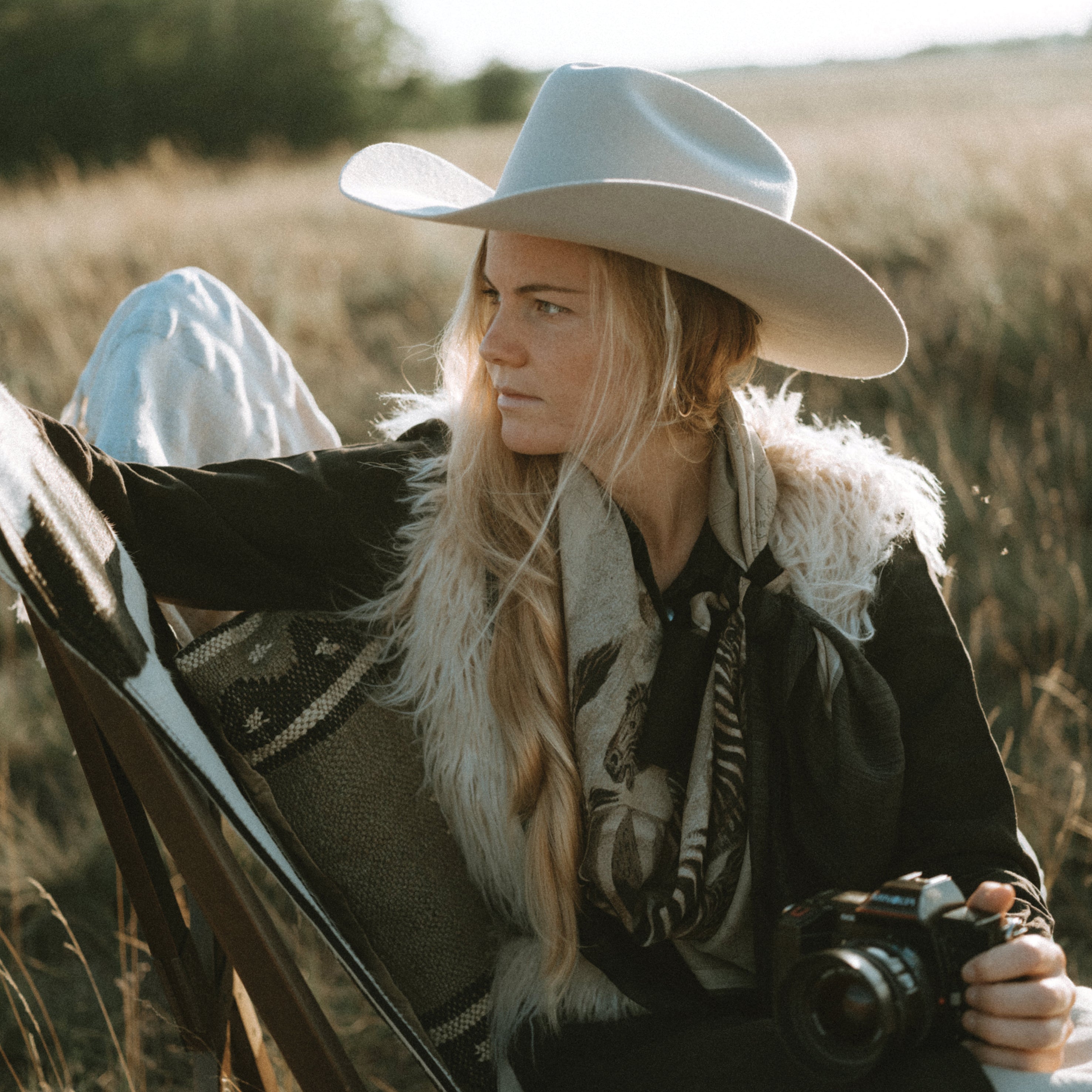 Maouli shawl silk and cashmere Zawadi girl with cowboy hat outdoor fields adventure