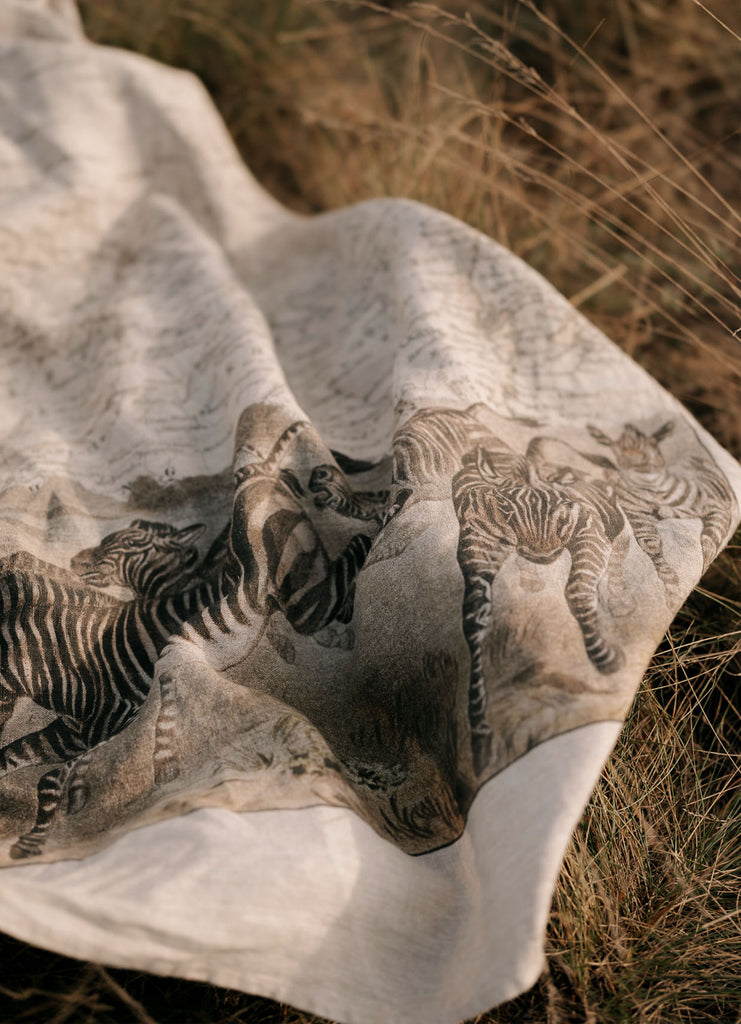 Maouli towel linen Nalangi lying in high grass